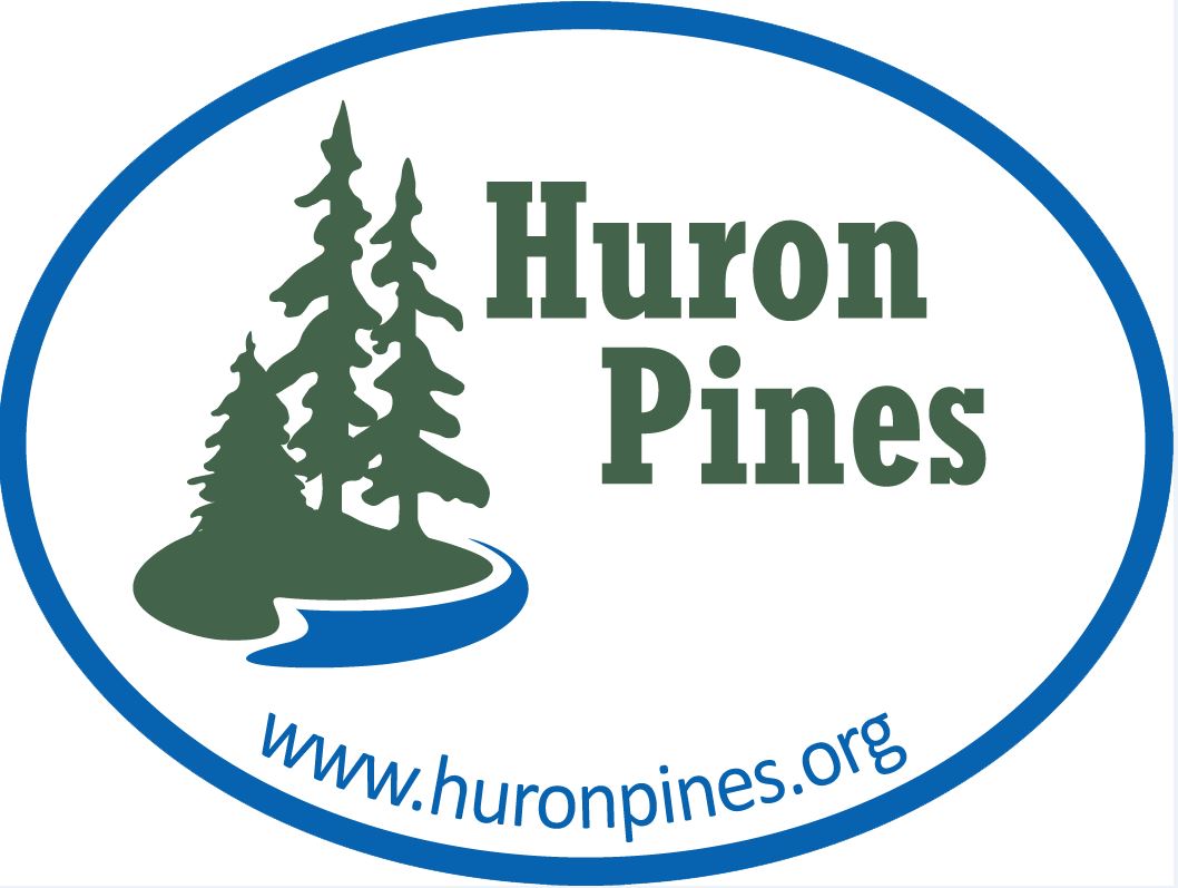 Huron Pines Logo with conifer trees